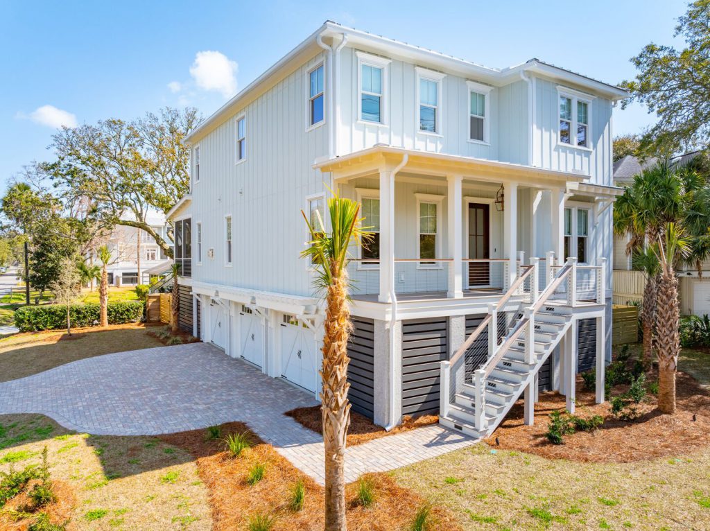 Outside picture of The Longboard home on Isle of Palms with a coastal vibe, luxury living, private pool, and more.